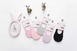 Detailed set of five cotton invisible boat socks in assorted pastel colors for women