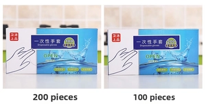 Detail of disposable food-grade PE gloves in dispenser boxes for home kitchen use