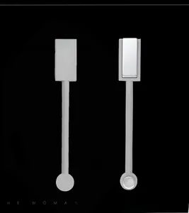 Close-up of double-headed magnetic tool for 3D cat eye nail art with rectangular and round heads