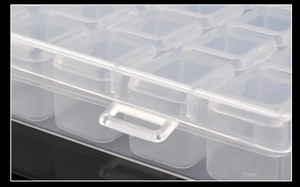 Detail view of 28-compartment clear plastic storage box with secure snap lids