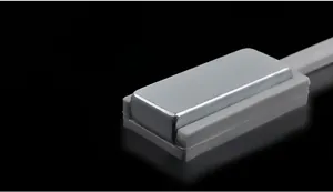 Close-up of dual-ended magnetic tool for 3D cat-eye gel nail art with strong magnets
