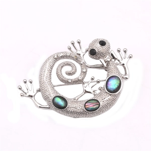 Silver lizard brooch with iridescent abalone shell inlays and sparkling crystal accents