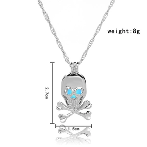 Silver skull and crossbones necklace with blue eyes and dimension labels on white background