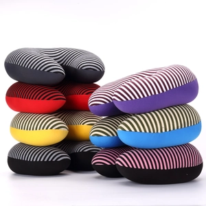 U-shaped travel neck pillows in colorful striped patterns displayed in multiple colors