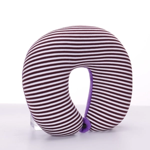 Detail of U-shaped neck pillow with purple and white stripes and secure buckle closure
