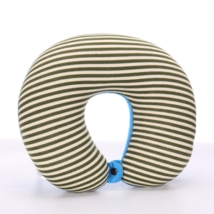 Detail of U-shaped neck pillow with green stripes and adjustable blue snap button