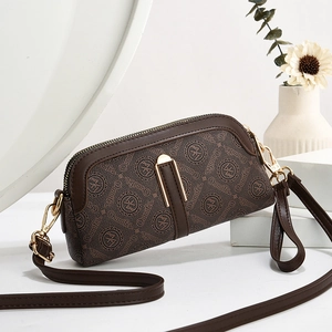 Brown leather crossbody bag with Oumifei monogram pattern and golden metal hardware