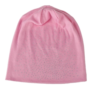 Detail of pink knitted beanie with sparkling silver rhinestones for winter warmth