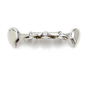 Macro view of polished silver-tone metal lower teeth grillz for hip hop vampire costume