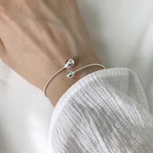 Bracciale rigido aperto in argento sterling S925 intrecciato con doppie sfere