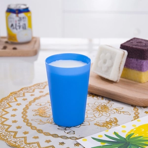 Close-up of blue plastic stacking cup used in children's logical focus training games