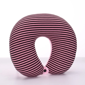 Detail of U-shaped travel pillow with black and pink stripes and secure snap fastener