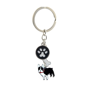 Detail of dog keychain with French Bulldog pendant, bone charm, and paw print tag