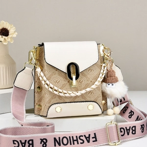 Vintage shoulder bag with monogram pattern, beige flap and pink wide fabric strap