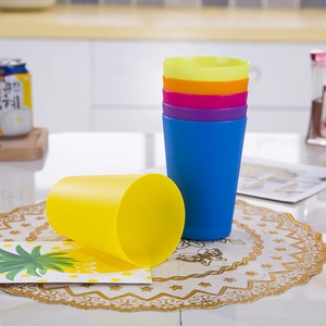 Colorful stacking cups for kids logic and focus training in bright kitchen setting