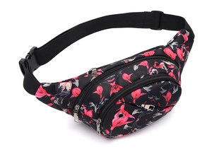 Detailed view of pink floral pattern on black waterproof nylon outdoor waist bag