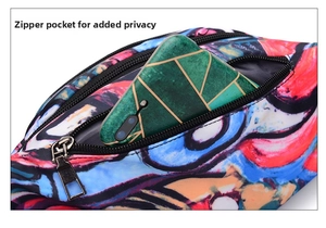 Detail view of colorful graffiti waist bag with secure metal zipper and phone pocket