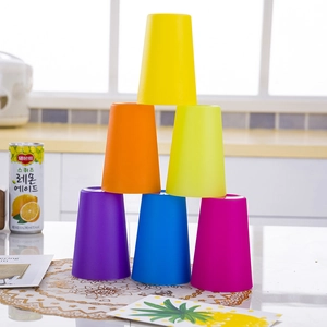 6 colorful stacking cups for kids logic training, arranged in a pyramid on a table