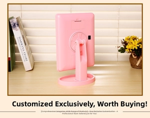 Rear view of pink LED makeup mirror showing battery compartment and 360 swivel stand