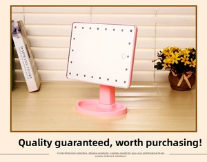 Pink LED makeup mirror detail featuring a touch sensor and base storage tray for jewelry