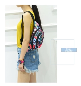 Detail of street graffiti pattern waist bag worn as a single shoulder cross-body pack