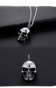 Detailed views of a punk style skull pendant with intricate blackened textures on a rope chain