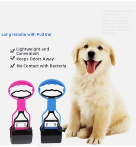 Detail of pink and blue pet pooper scoopers with long ergonomic handles and spring claws