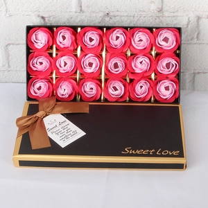 Detail of 18 red and pink soap roses in a black 'Sweet Love' gift box for Valentine's Day