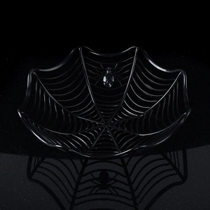 Close-up of black spider web candy bowl with spider detail for Halloween decor