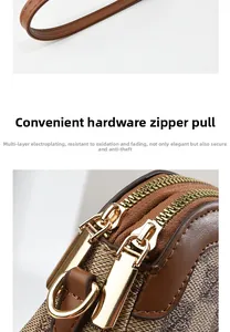 Detail of brown monogram phone bag with durable gold-plated zippers and D-ring buckle
