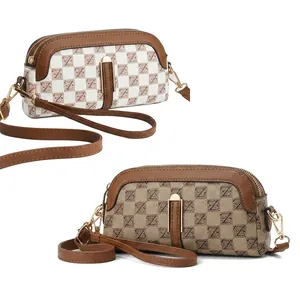 Detail view of white PU leather mobile phone bag with letter print and adjustable strap