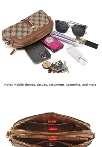 Detail view of brown vintage leather crossbody phone bag showing internal storage compartments