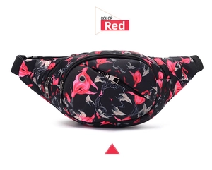 Detail view of floral waist bag showing waterproof fabric and adjustable nylon strap