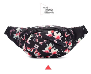 Detail view of floral sports waist bag featuring a winter jasmine print and headphone jack