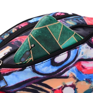 Waterproof sports waist bag with graffiti pattern showing a smartphone in back pocket