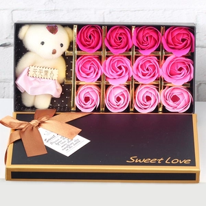 Detailed gift box with 12 gradient pink soap roses and a cute plush bear toy