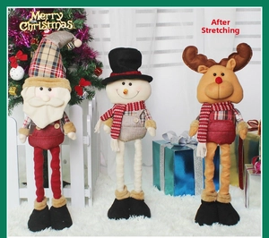 Close-up of telescopic Christmas figures with Santa, snowman and elk in a festive setting