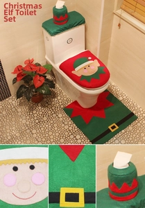 Detailed view of Christmas elf toilet seat cover, rug, and tissue box set in festive red and green