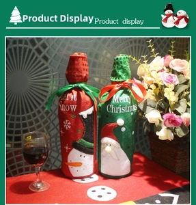 Detailed view of sequined Christmas wine bottle covers with Santa and Snowman embroidery