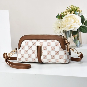 Elegant white crossbody phone bag with brown monogram pattern and golden metal hardware