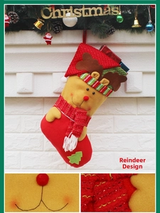 Close-up of reindeer Christmas stocking with 3D antlers and plush fabric texture