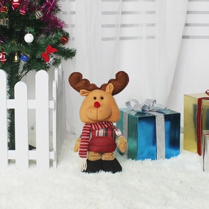 Standing plush Christmas reindeer in red plaid overalls and striped scarf home decor