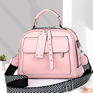 Minimalistische roze PU-lederen crossbodytas met geweven riem en zilveren hardware