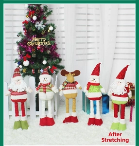 Detailed view of telescopic Christmas plush toys in fully extended holiday setting