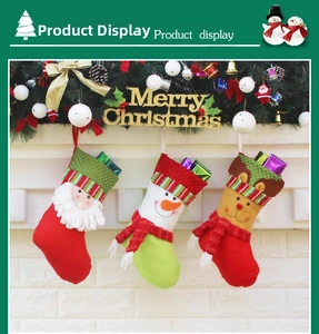 Close-up of 3D Santa, Snowman and Reindeer Christmas stockings hanging on fireplace mantel