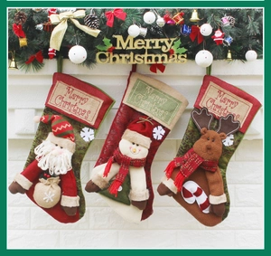 Detailed Christmas stockings featuring Santa, Snowman and Reindeer on a white fireplace