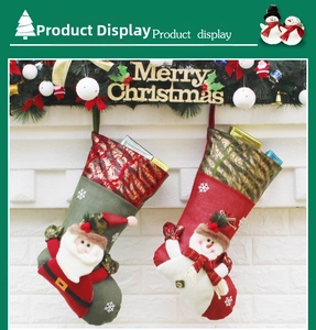 Detail of red and green Christmas stockings with Santa and Snowman sequin embroidery