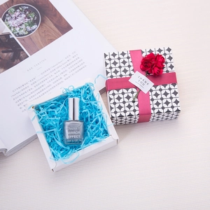 Silver mirror effect nail polish 10ml in a white gift box with blue shredded paper fill