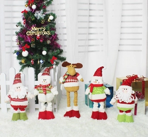Detailed arrangement of telescopic Santa Claus, snowman, and reindeer plush festive dolls