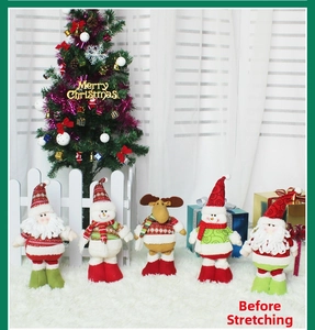 Detail view of 5-piece retractable Christmas plush set including Santa and Snowman